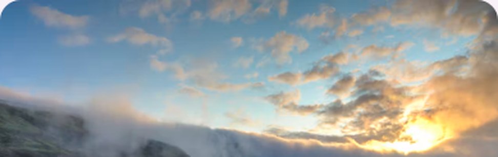 Sunrise over mountain fog
